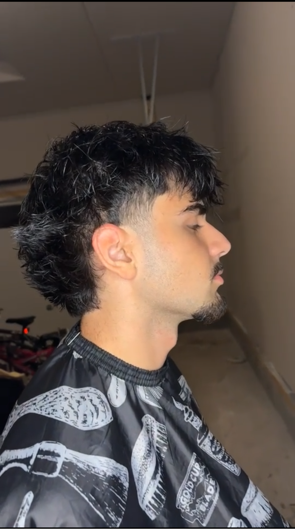 Modern mullet with a smooth temple fade